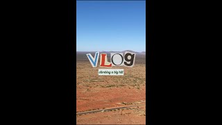 Climbing a big rocky hill in Western Australia