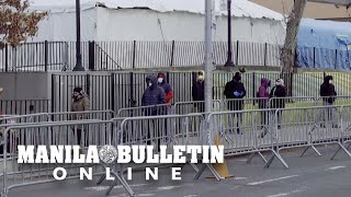 Coronavirus: New Yorkers line up for testing outside hospital