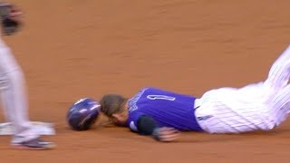 Barnes hits the ground hard as he slides