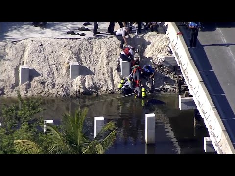 Rescue divers jump into canal in El Portal