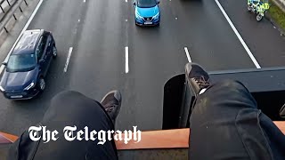 video: Watch: Former civil servant 'scared of heights' despite hanging from M25 gantry in Just Stop Oil protest