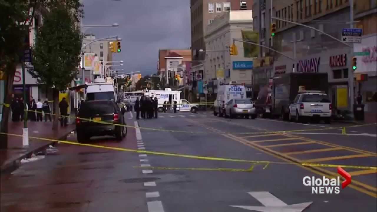 New York City investigates hatchet attack on police - YouTube