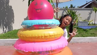 Keysha Play with Inflatable Stacking Rings Toys While Learning Colors - Finger Balloons