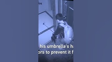Boy uses umbrella to prevent elevator door from closing, causes free fall 😮 #cgtv