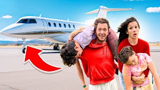 SNEAKING our kids onto the PLANE! *unexpected surprise*