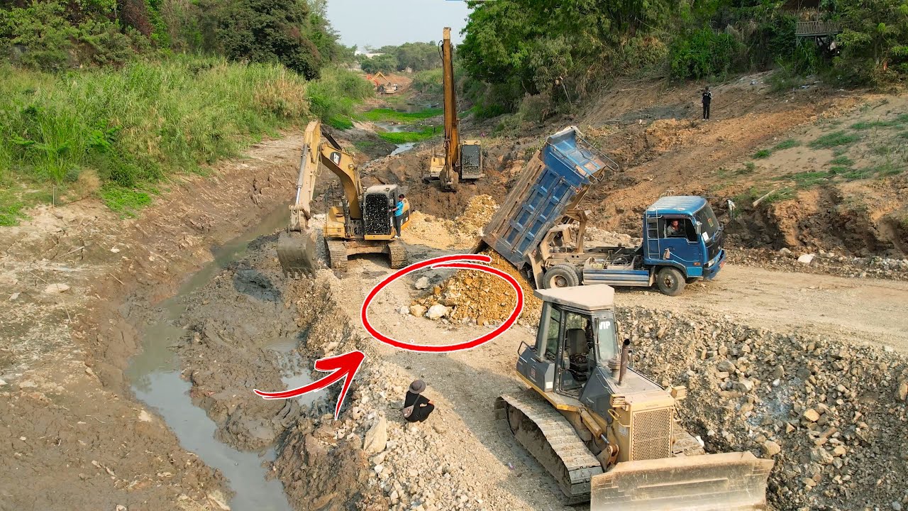 The Operator Excavation and bulldozer activities, digging canals, pouring gravel and stones