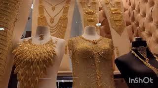 محلات الذهب في دبي $ اكبر وافخم المحال في دولة الامارات ، لباس كامل من الذهب الخالص عيار 21