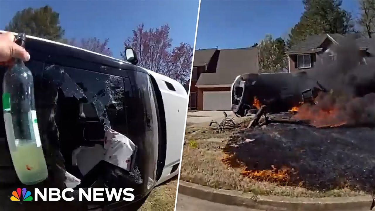 Officers find bottle of alcohol on driver they rescue from overturned car Officers find bottle of alcohol on driver they rescue from overturned car