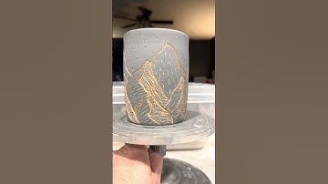 Freshly carved sgraffito mountain mug. #pottery #ceramic #sgraffito