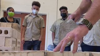 Winston-Salem construction trades teacher aims to build his students up brick by brick