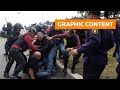 Warning graphic content  protesters attack argentine official over bus driver murder