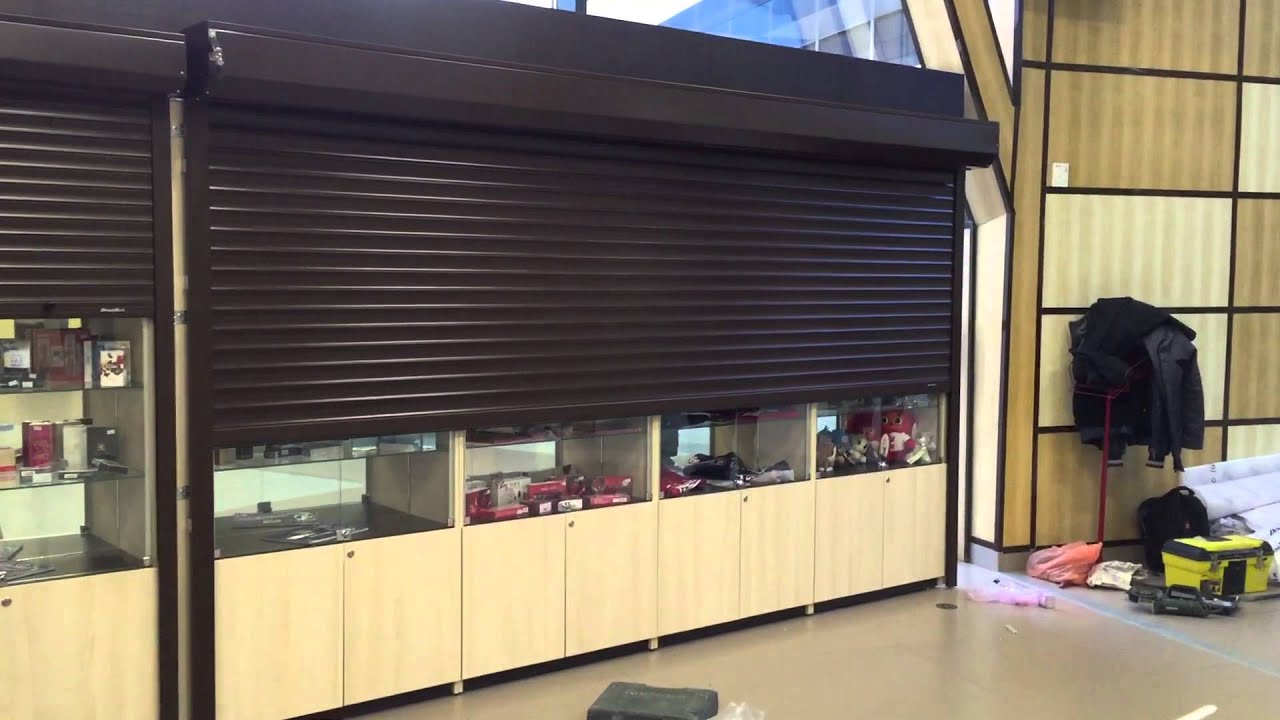 Защитная роллета с электроприводом. Аэропорт Симферополя. - YouTube