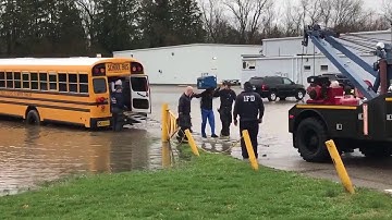 Indy firefighters rescue students from back of school bus stuck in deep water
