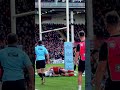 WHEN RUGBY MEETS WRESTLING: Championship Wrestler Kirill Gotovtsev slams Mike Brown to the floor