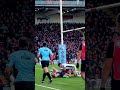 WHEN RUGBY MEETS WRESTLING: Championship Wrestler Kirill Gotovtsev slams Mike Brown to the floor