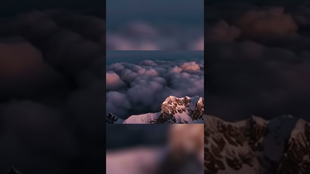 Sunrise Magic: Mountains Erupt in Golden Light 