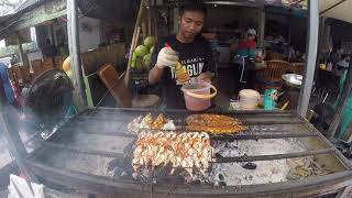 Cooking fish and seafood on Jimbaran beach. Bali