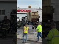 Recycling truck crashes into Napa auto dealership