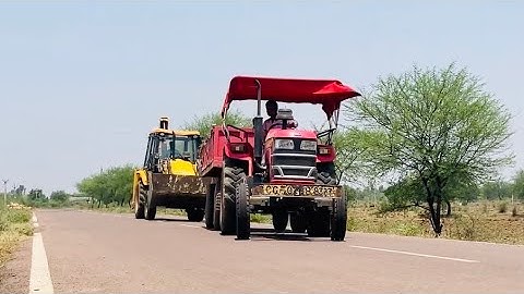 Jcb Backhoe Machine Loading Mud In John Deere 5042 D And Mahindra YUVO 475 Di For Making Pond