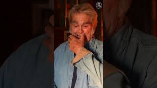 Man Shows Us His Antique Wooden Boy Pillow