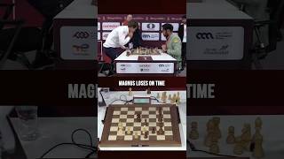 Magnus slams the table after losing on time