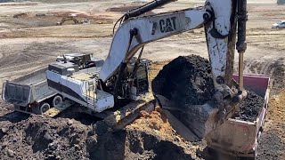 Caterpillar 375 Excavator Loading Mercedes & MAN Trucks