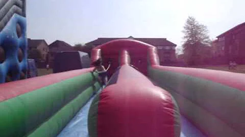 Alice henson and Sophie Auld on a run bouncy castl...