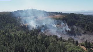 Fire contained after car sparks brush near Salem