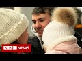Ukrainians return to country to take up arms against Russia - BBC News