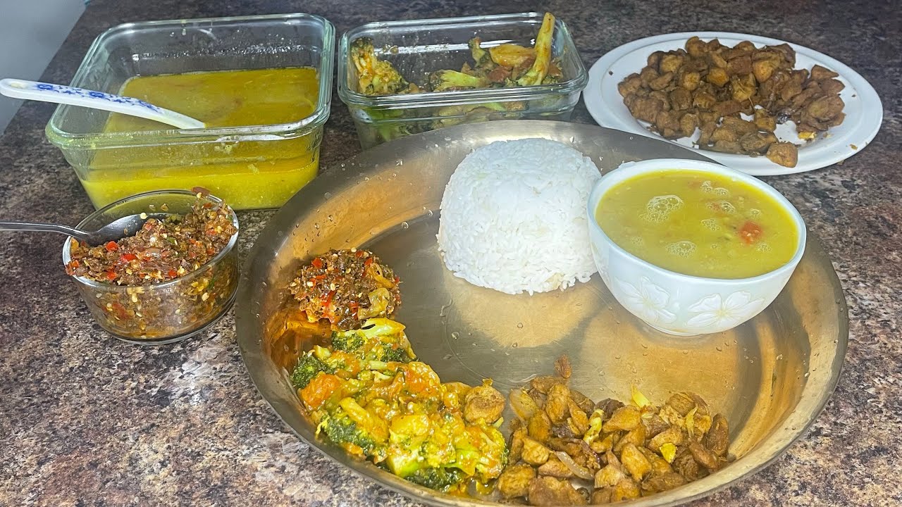 Daily routine. Cooking easy veg Lunchthali . Soya chunks, lentils, rice,broccoli, & potatoes 
