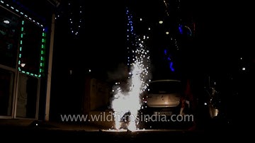 Diwali crackers in slow motion - ground phirki and anar or flower pot in action