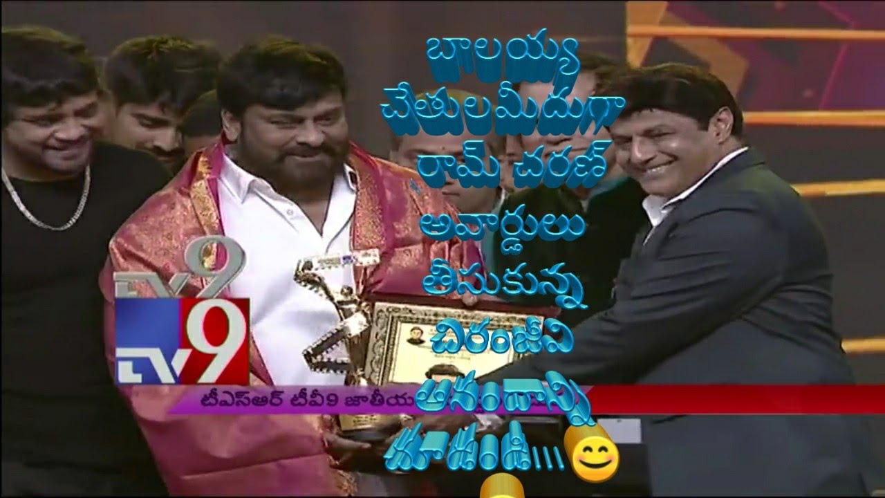 Chiranjeevi taking awards of Ramcharan from Balakrishna