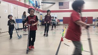 West Oakview first graders practice their scooter skills