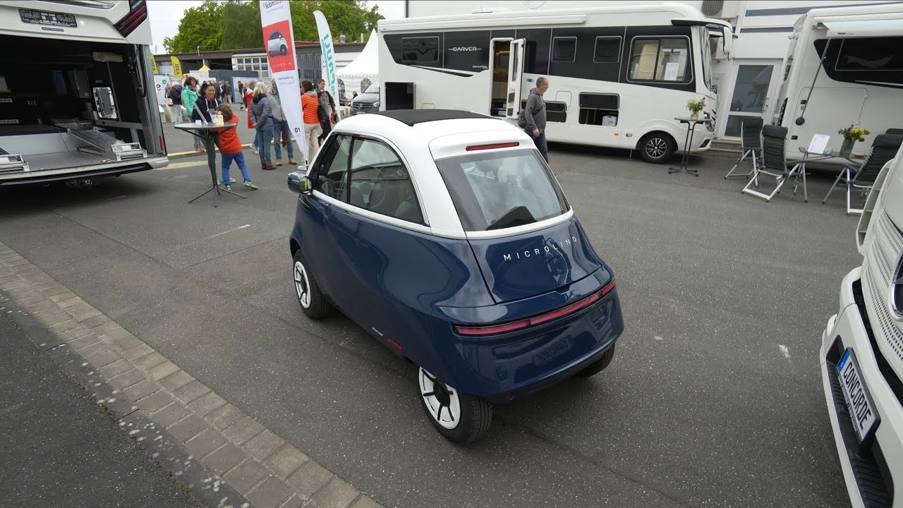 CAMPING FANS BEGEISTERT: Wohnmobil Mini-Auto 90km/h Concorde Microlino  passt in fast jedes Wohnmobil
