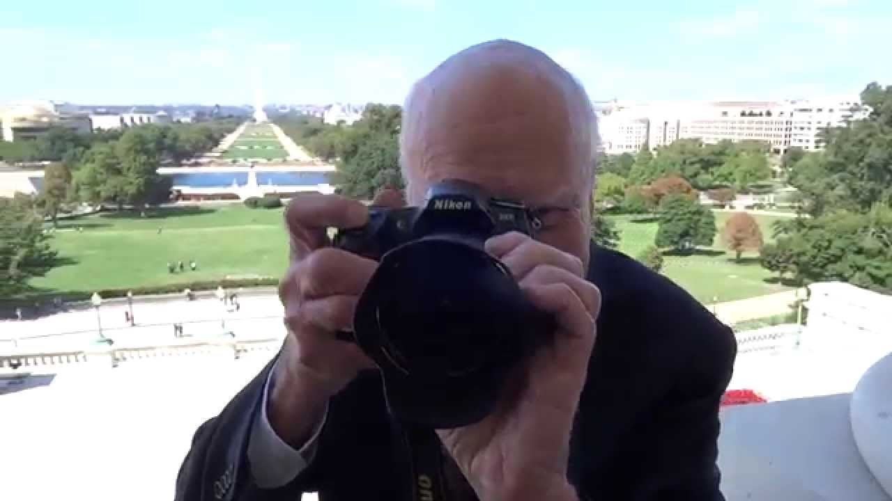 DC photojournalist catches veteran Capitol Hill political photographer in action