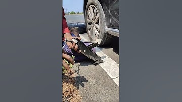 how to use Car jack that comes with car #carjack #shorts #shortsfeed #volkswagen #roadsideassistance