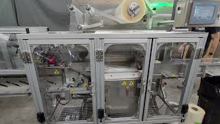 IQ-M6000 with and IQ-ELS and IQ-FLO Machines filling labeling and packaging bi plate.