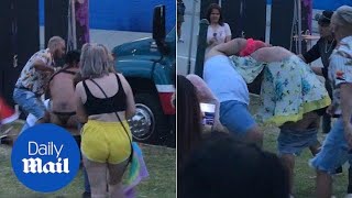 Bizarre Moment Pink-Haired Man And Thong-Clad Pal Fight At Party