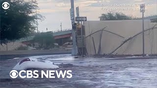 Woman pulled from car moments before it's swallowed by a sinkhole in El Paso