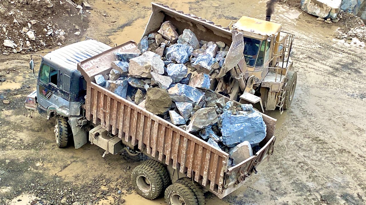 The loader was overloaded due to the stone being so large and successfully lifted the stoneOctober29
