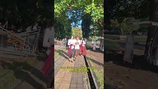 Beautiful mothers and handsome fathers wearing Balinese traditional clothes at Renon field part 4