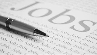 A look at the economy: Unemployment drops, jobs added, stock market soars