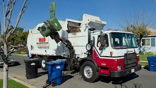 Universal Waste Systems: Two Heil and McNeilus Side Loader Garbage Trucks on Recycle and Yard Waste!