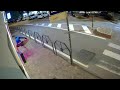 Trento, il video: impugna un tombino e lo usa come ariete per sfondare la porta del bar tabacchi ...