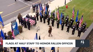 Exclusive Flags at half-staff to honor fallen officer Profile