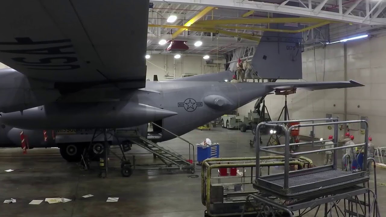Airmen attach tail to aircraft timelapse