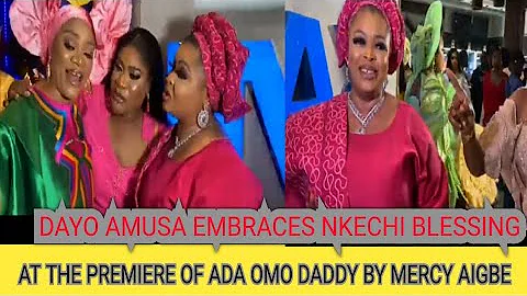 DAYO AMUSA EMBRACES NKECHI BLESSING AT THE PREMIERE OF ADA OMO DADDY BY MERCY AIGBE