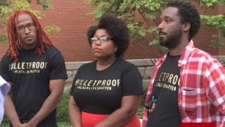 Clinton meets with #BlackLivesMatter protesters after the...