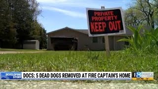 Deputies: 5 dead dogs removed from ex-fire captain’s home