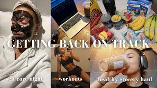 GETTING BACK ON TRACK after traveling: grocery haul, self care night + fitness identity crisis?!